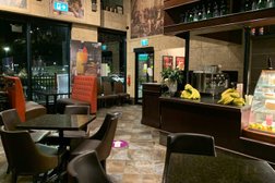Symposium Cafe Restaurant & Lounge in Oshawa